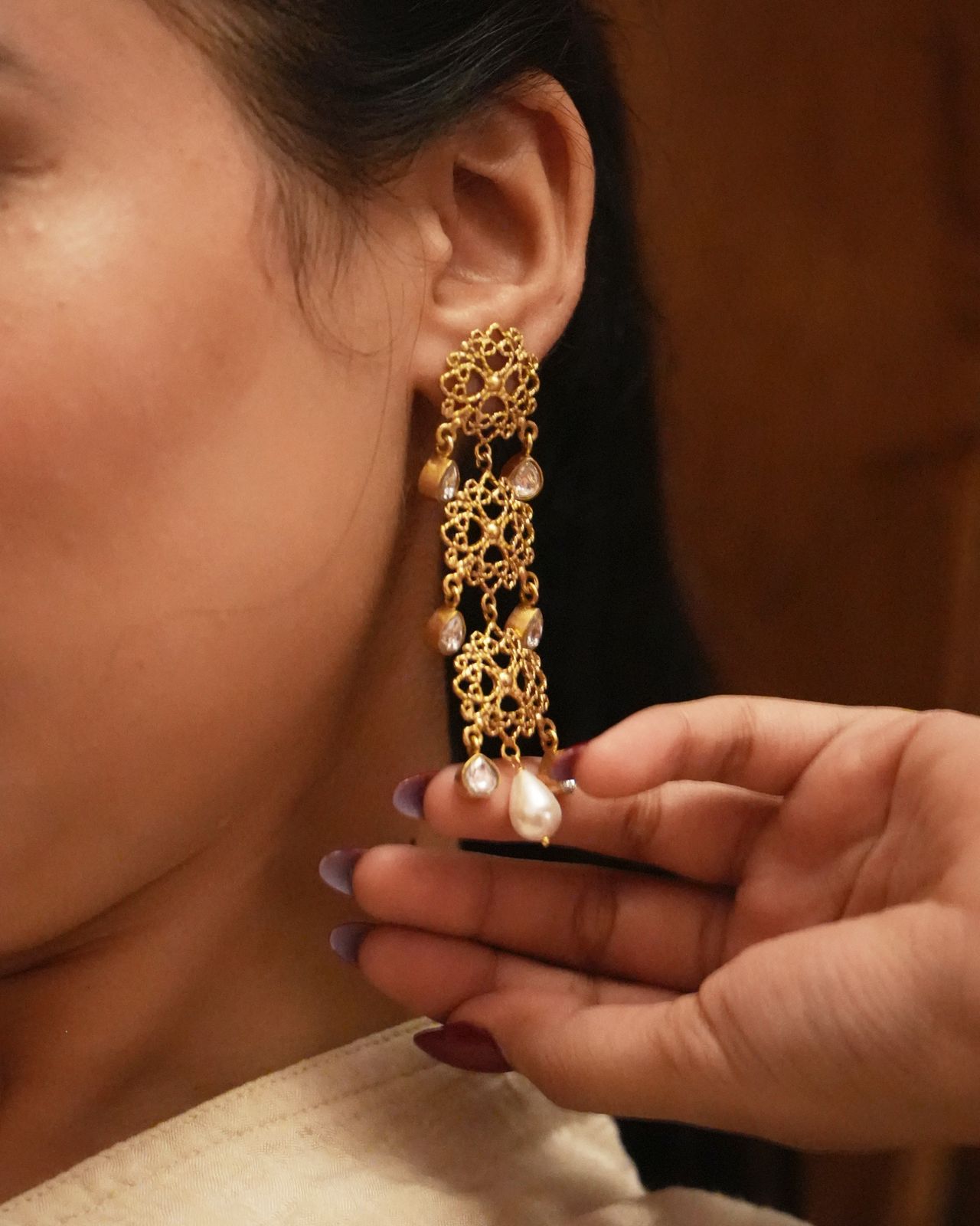 Charu Earrings handcrafted in 92.5
Sterling Silver, dipped in 1 micron Gold plating, Filligiri earrings with Polki and Pearls.